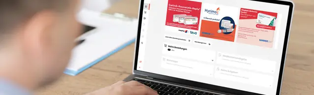 Arzt vor Laptop mit Zur Rose Studio